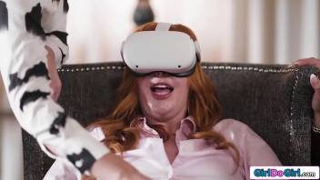 Busty redhead gets vr toying experience