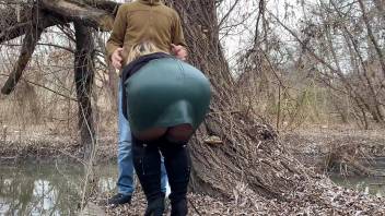Squeezing my stepmother in law's fat ass in a leather skirt before she helps me pee outside